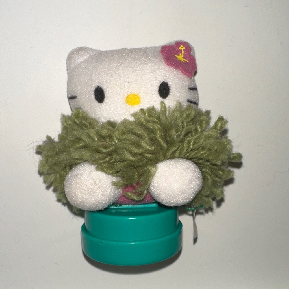 Vintage Hawaiian Hello Kitty Stamp with Plush on Top “Have a Sunny Day”